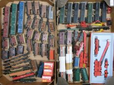 Sixty Tri-ang and Hornby 00 gauge model railway wagons, vans and cranes.