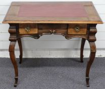 A leather inset mahogany writing table / desk with two small drawers raised on cabriole legs, W83