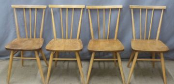 Four Ercol light elm comb back chairs