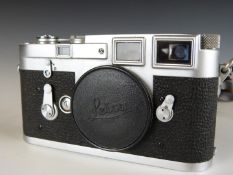 Leica M3 35mm rangefinder camera body, serial number M3-876515, circa 1957