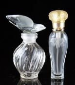 Two Lalique for Nina Ricci L'Air du Temps glass scent bottles, one with dove in flight stopper the