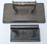 Two large Salter flat irons or weights, both rectangular, one marked Dolphin, possibly of British