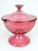 Cranberry glass covered pedestal punch bowl, 29cm in diameter, 30cm tall.