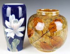 Royal Copenhagen vase with floral decoration, H17cm, and a Royal Doulton vase with autumn leaf