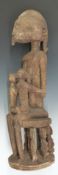 African tribal Dogon carved maternity figure of a mother suckling two infants raised on figural