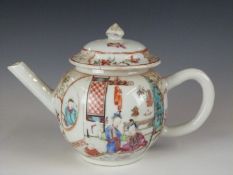 An 18thC Chinese teapot with figural decoration, H13cm