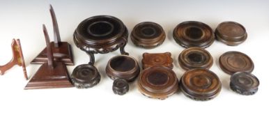 A small collection of Chinese wooden stands