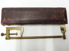 19th/20thC brass camera lucida with clamp attachment and swivel head, length of case 23cm