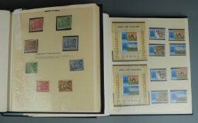 An extensive collection of Ghana stamps 1957-1973 mint and used, some covers, in two Golden albums