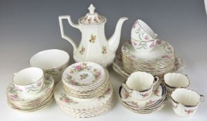 Approximately 22 pieces of Royal Albert tea ware decorated in the Moss Rose pattern and further