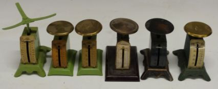 Six sets of Salter postage or similar scales, all but one having rates to scales