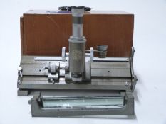 C. Baker London cased travelling microscope with vernier scale, length of case 34cm