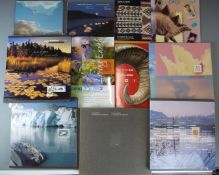Four Canada Yearbooks and The Millennium Collection limited edition Yearbook. Also various