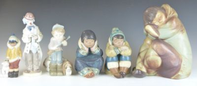 Six Lladro figures including four Eskimos, tallest 23cm