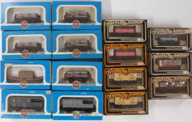 Fifteen Airfix and Mainline 00 gauge model railway wagons and vans including Highley Mining
