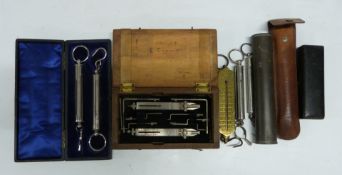 Eight cased Salter spring balances comprising pair in fitted case, letter scales in pouch, small