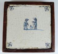 Delft tile with decoration of golfers, diameter 14.5cm