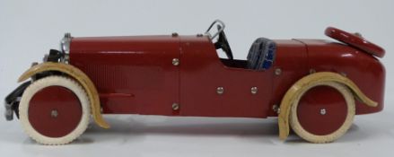 Meccano Constructors Car No 2 with red body and hubs, blue seats, cream mud guards and white