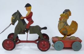 Two children's pull along toys, a wooden horse with huntsman and a tin plate chicken.