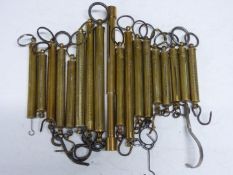 Eighteen cylindrical Salter spring balances including 10lb compression example, Troy and Newton