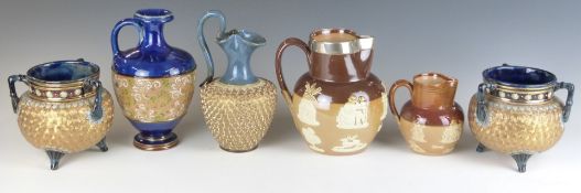Six Royal Doulton and Doulton Lambeth jugs, cauldrons, vase and ewer, includes a hallmarked silver