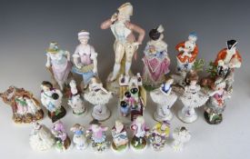A large collection of 19th/20thC continental figures, mainly German including Dresden lace,