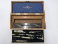 Victorian oak cased Stanley draughtman's set with lift out tray of ivory handled and other