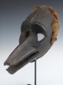 African tribal Bamana (Mali) hyena mask on bespoke stand, H40cm on stand