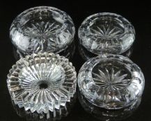 Four clear cut glass ashtrays comprising one Joseph Riedel with starburst design and three Tudor