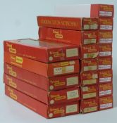 Twenty Tri-ang and Tri-ang Hornby 00 gauge model railway coaches in maroon liveries, all in boxes.