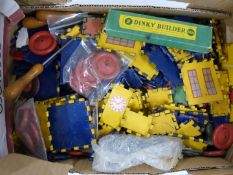 A collection of Meccano Dinky Builder parts including wheels, rods etc, some in original boxes.