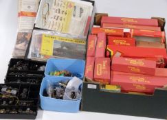 A large collection of Tri-ang and Hornby 00 gauge model railway catalogues and empty boxes.