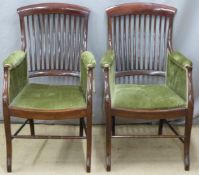 A pair of Victorian upholstered mahogany armchairs, H97cm