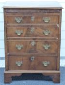 A mahogany bachelor's chest of four graduated drawers with brush slide, W56 x D40 x H75cm
