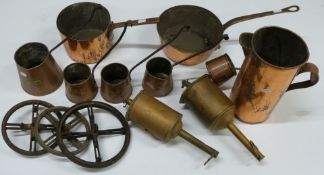 Two heavy copper pans, probably 19thC, graduated jugs, two clockwork roasting jacks and
