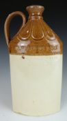 Doulton Lambeth stoneware spirit flask impressed J S Williams & Son, importers of wines and spirits,