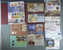 A collection of coin/stamp covers, loose and in album (48), includes Amazon, Darwin, World