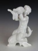 Bing & Grondahl blanc-de-chine figurine of a girl on a dolphin c1950, H20cm