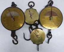 Four Salter spring balances with circular brass dials comprising two 250lb examples with applied CO2