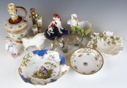 A collection of ceramics including German animal figures in the style of Nymphenburg, majolica,