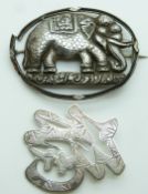 Chinese silver brooch by Wai Kee and a white metal brooch depicting an elephant