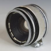 Canon 35mm f 1:1.8 camera lens with screw mount and Leica lens cap