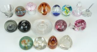 Seventeen glass paperweights and small vases including Caithness, Orrefors, Wedgwood etc, some