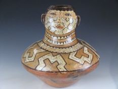 Peruvian Shipibo large pottery face pot, possibly Gansu province, for similar see Ronald W