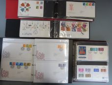 Seven GB first day cover albums including definitives, mini sheets, high values etc