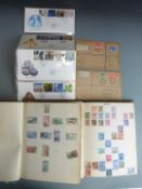 Two stamp albums of all world stamps mostly first half 20thC, two early first day covers for
