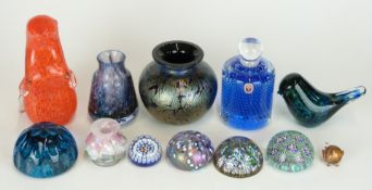 Twelve pieces of coloured glassware including Isle of Wight and Wedgwood glass paperweights, Royal