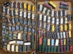One-hundred-and-thirteen Tri-ang and Hornby 00 gauge model railway wagons, vans and tankers.