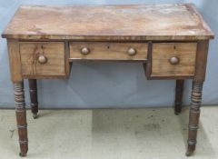 19thC mahogany desk fitted three drawers and raised on turned legs, W101 x D53 x H72cm