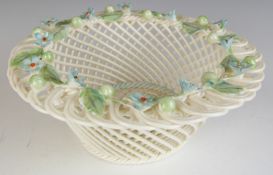 Belleek porcelain basket with applied flower decoration, diameter 14.5cm